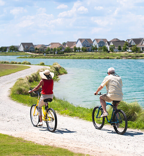 Residents biking in Riverlights community in Wilmington, NC