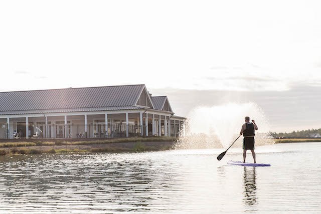 Paddle boarding in lake at Riverlights