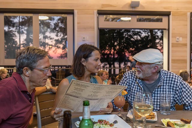 Couple enjoying dinner at Smoke on the Water in Riverlights