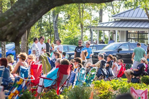 Residents and guests enjoying outdoor concert event in Riverlights