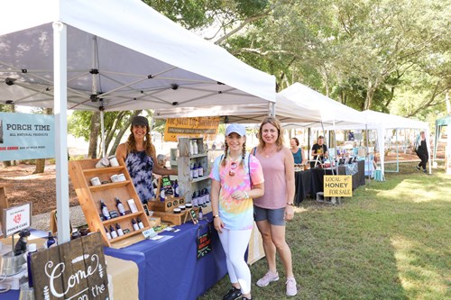 Vendor tents set up for the Marina Village Marketplace in Riverlights