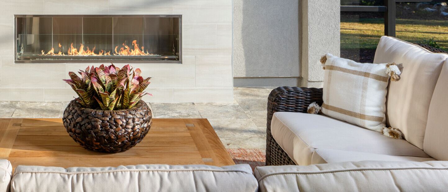 Living area with fireplace, waterfront homes in Riverlights.
