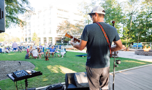 Band playing at outdoor event in Riverlights