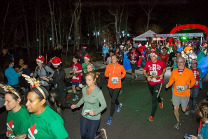 Runners at Dashing Thru the Glow 5K run