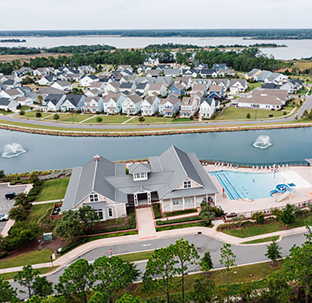 Aerial view of Riverlights clubhouse, pool and lake