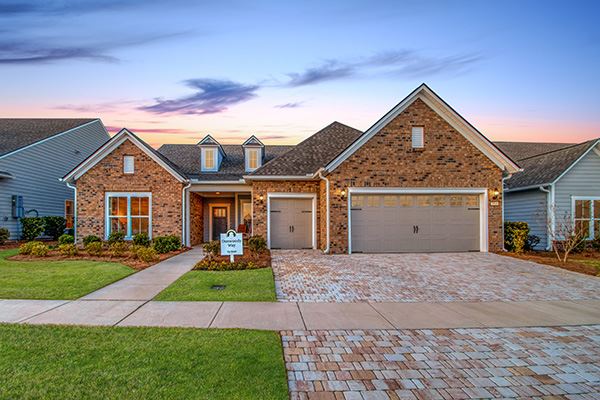 Exterior model home by Del Webb 55 plus in Riverlights community in Wilmington, NC
