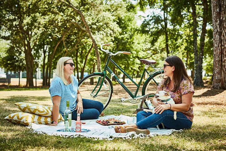 Two residents having a picnic within Riverlights community in Wilmington, NC