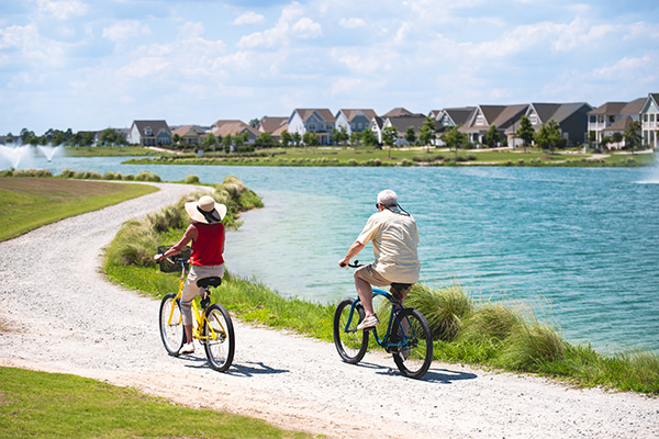 Residents biking in Riverlights community in Wilmington, NC